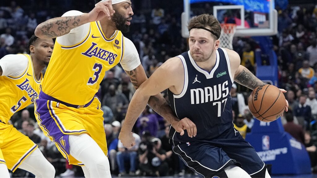 Anthony Davis guards Luka Doncic